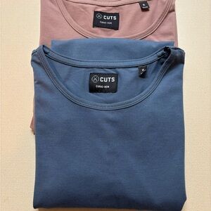 Two Men's Short Sleeve Cuts, Curve-Hem Shirts in Denim Blue and Mountain Mist.